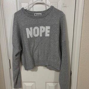 Gray Sweater with 'NOPE' Design